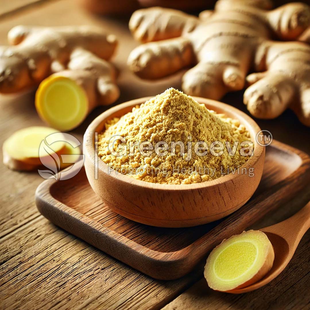 Ginger Powder in a wooden bowl surrounded by ginger roots.